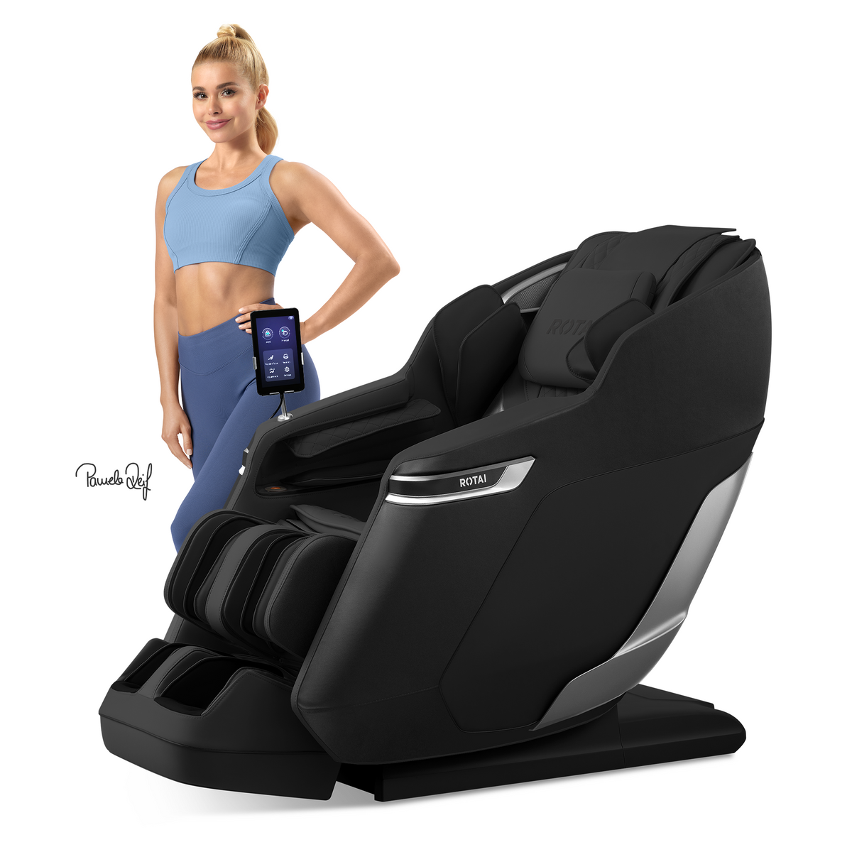 A black ROYAL massage chair with silver trim, shown on a white background with a woman in athletic wear holding a tablet next to it.